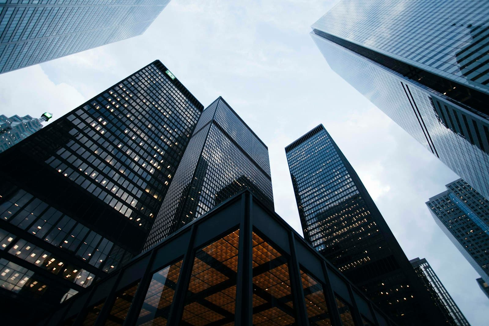 Photo: Sean Pollock, Unsplash Looking up at glass office towers against the sky